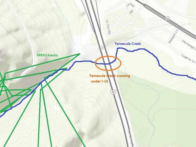 The path of a mountain lion known as M93 is represented by the green lines. A safe crossing that goes under the eight lanes of Interstate 15 is circled in orange.