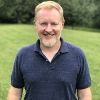 Thomas Minney standing outside