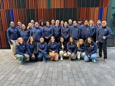 A group of coral reef managers get together for a photo at the International Coral Reef Symposium in New Zealand.