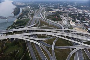 Aerial image of highways and roads overlapping at major intersection. 