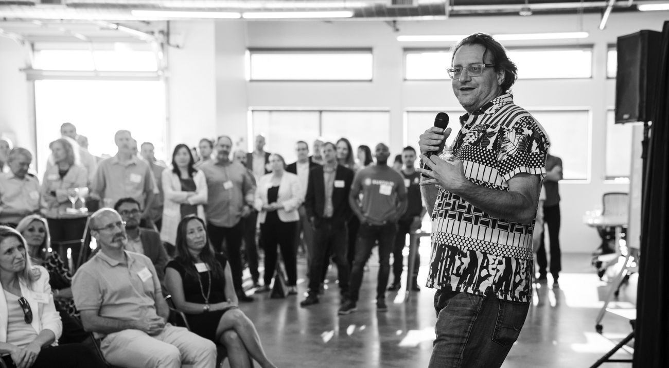 A man speaks to a room full of Techstars participants