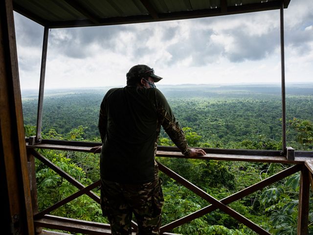 Ranger Ernesto Velasquez at the surveillance lookout. Belize Maya Forest.