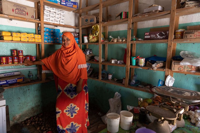 Fatuma Athman stands in her shop in Pate, Kenya.