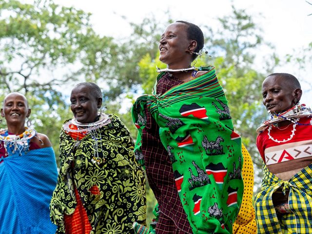 Maasai women perform traditional dances for visitors to the Randilen Enaboishu Women's Trading Center in Tanzania.