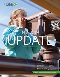 Cover artwork for TNC Indiana spring 2025 newsletter featuring little girl looking through a spotting scope.