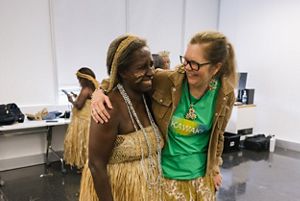 Robyn James and a workshop participant hug each other and smile.