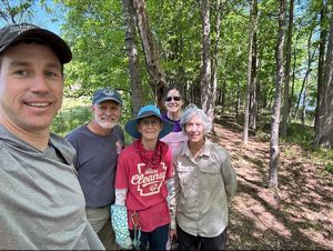 Group of volunteers pose for a photo.