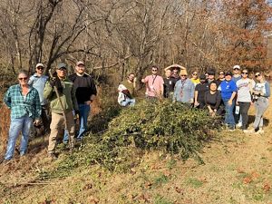 Group of volunteers pose for a photo.