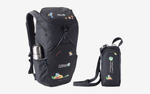 A black backpack and black water bottle sling on a white background feature TNC's logo and 75th anniversary icons.