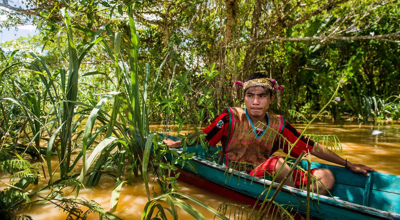 A local resident canoes in East Kalimantan, Indonesia.