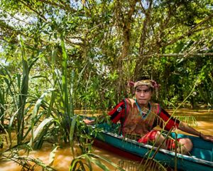 A local resident canoes through East Kalimantan, Indonesia.