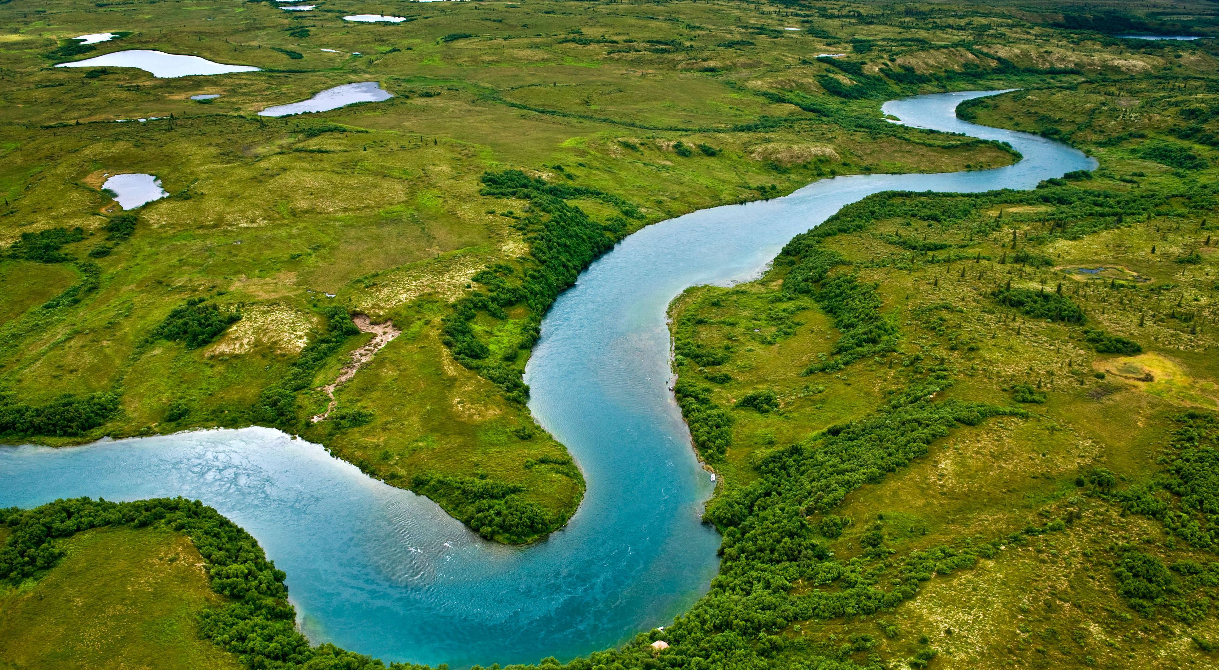 Aerial photo of a river winding through countryside. 