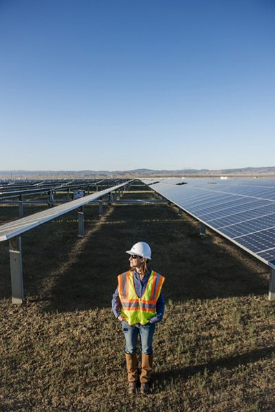 Worker at solar panels.