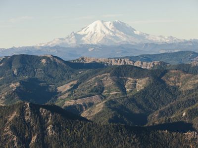 and Mount Rainier in the background. These are working forests, central to the area’s resource and recreation-based economy.