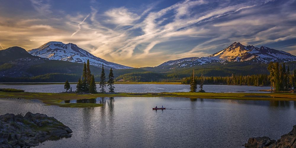 A lake surrounded by mountains.