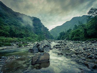 A rocky river passes through the Laohegou Reserve