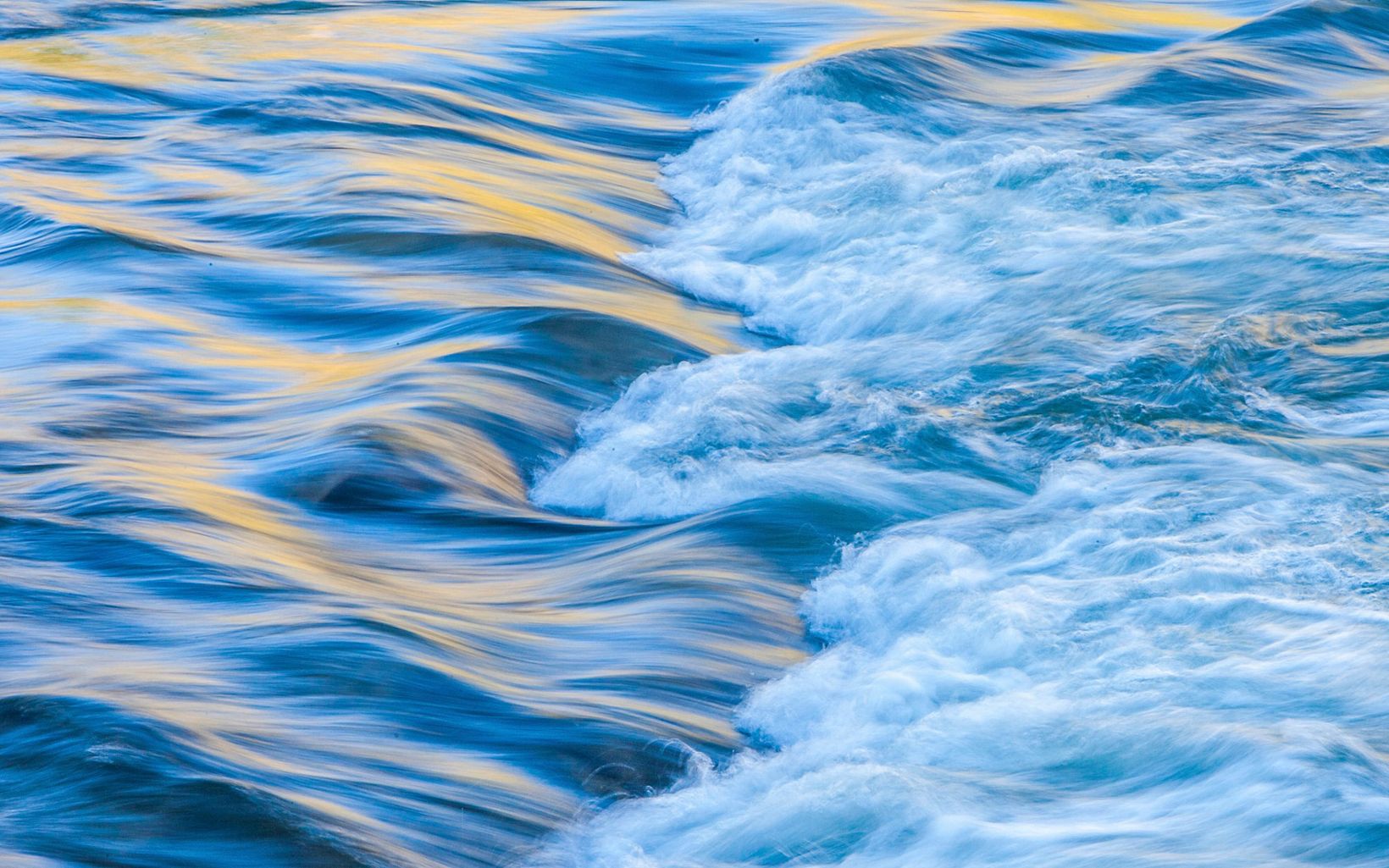 rippling waves of blue and white water