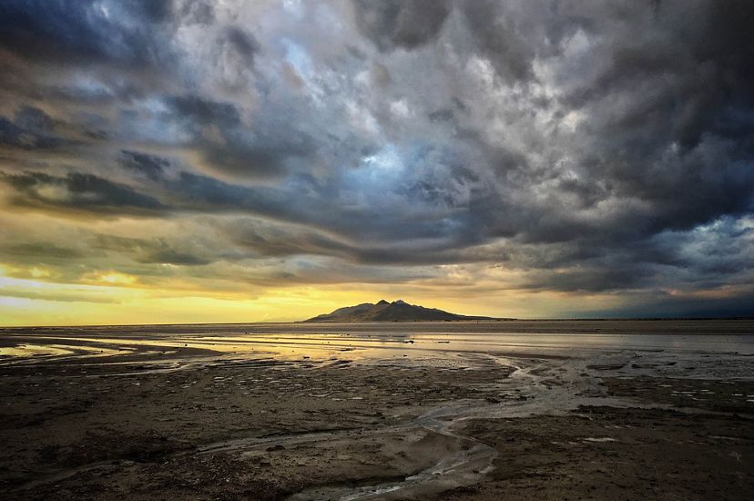 Heavy, dark storm clouds hang low over the Great Salt Lake.