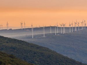 Wind farm turbines situated on a ridge top in the Appalachian mountains of West Virginia.