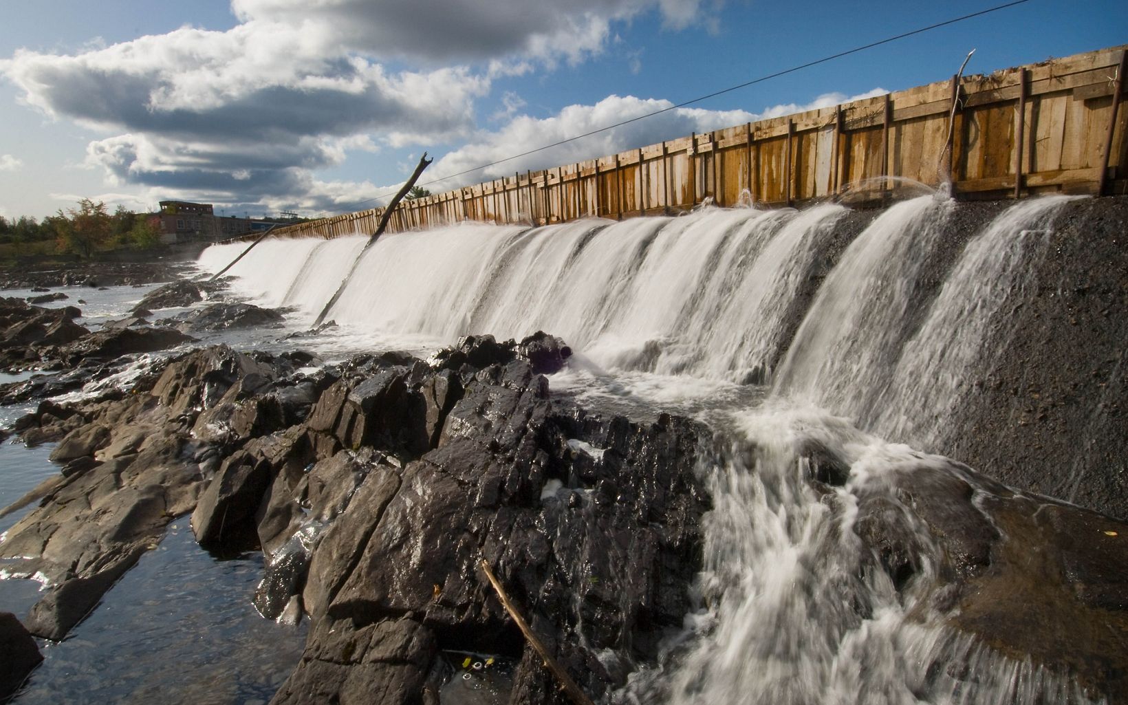 A portion of the old Howland Dam on the Penobscot River to be removed in Howland, Maine.