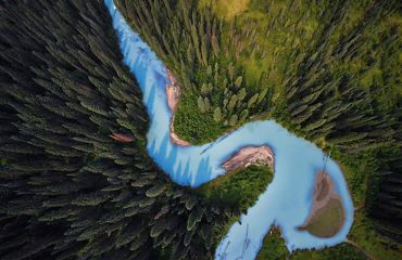 Aerial view of a glacial river in British Columbia.