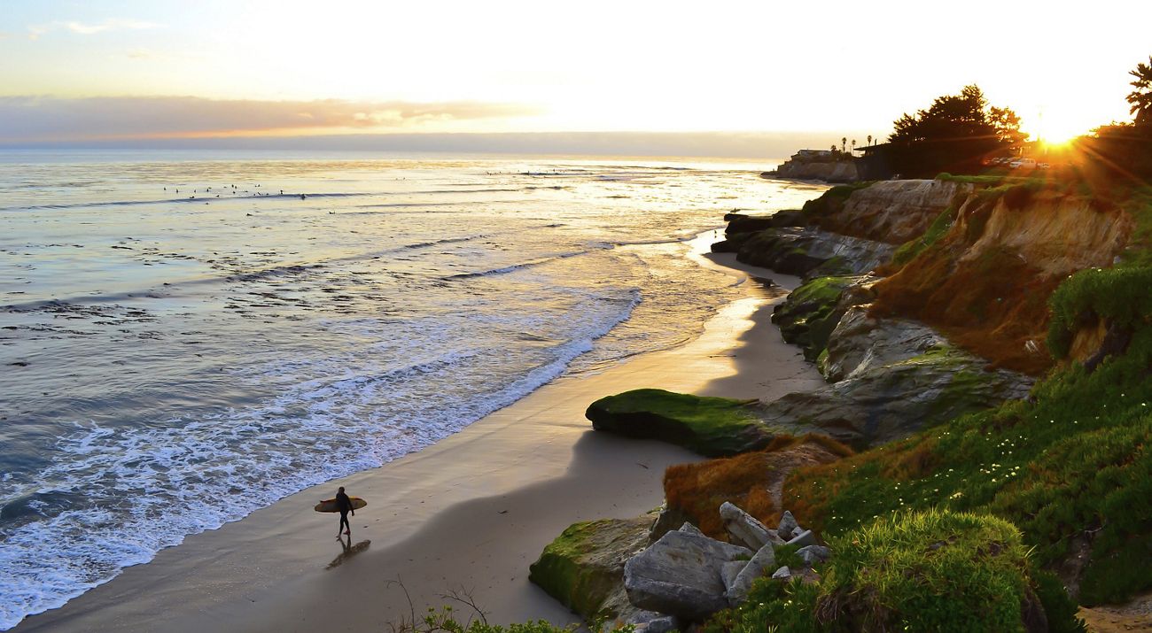 East Cliff surfer at Pleasure Point Overlook in Santa Cruz, California.