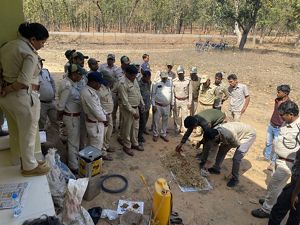 A group of people watching a demonstration.