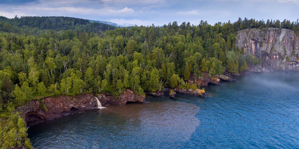 View of trees along the Lake Superior shore.