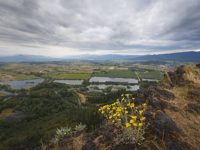 The view from the southern tip of Lower Table Rock during a stormy spring evening overlooking the Rogue Valley in southern O