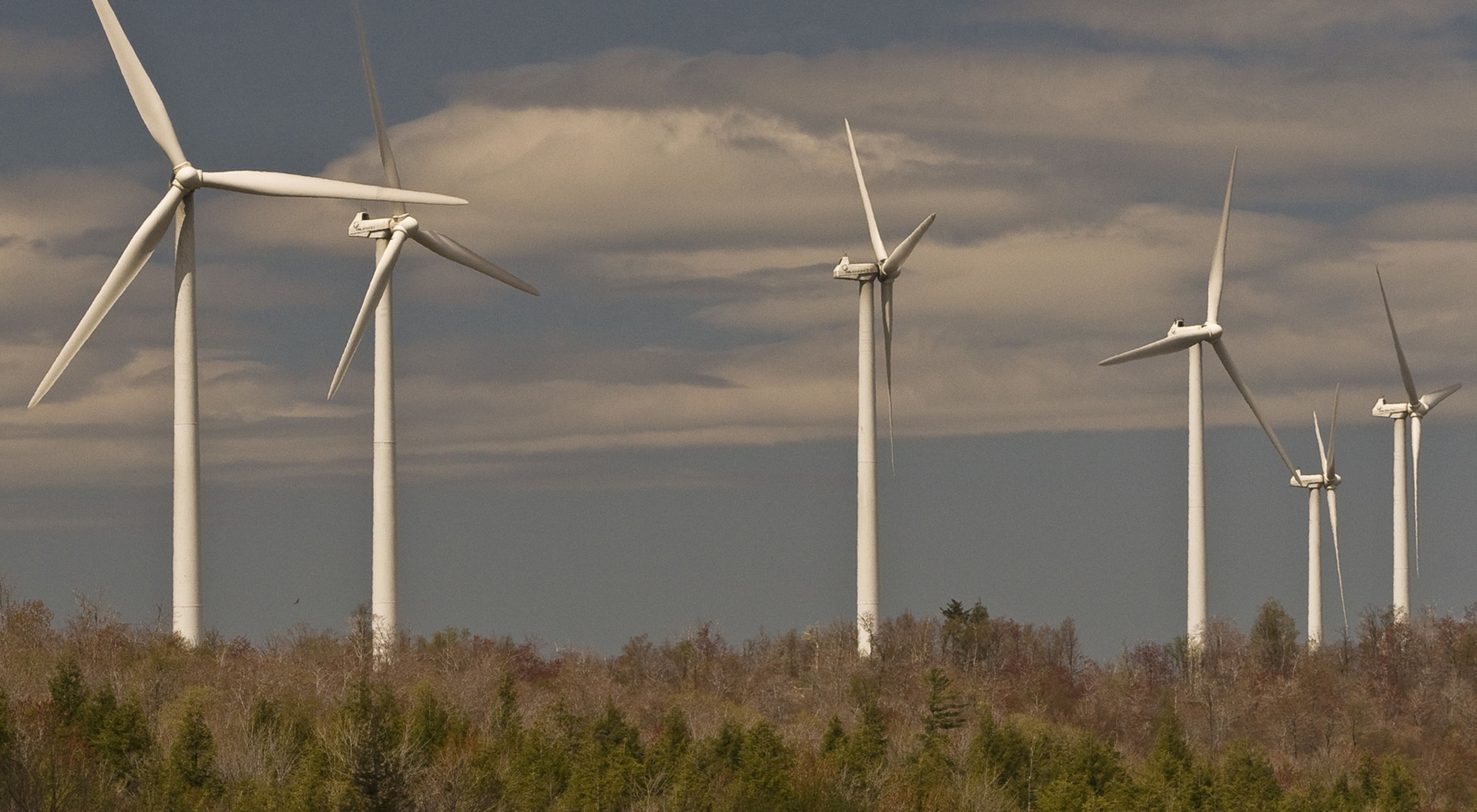 Photo of six white wind turbines on West Virginia ridge.