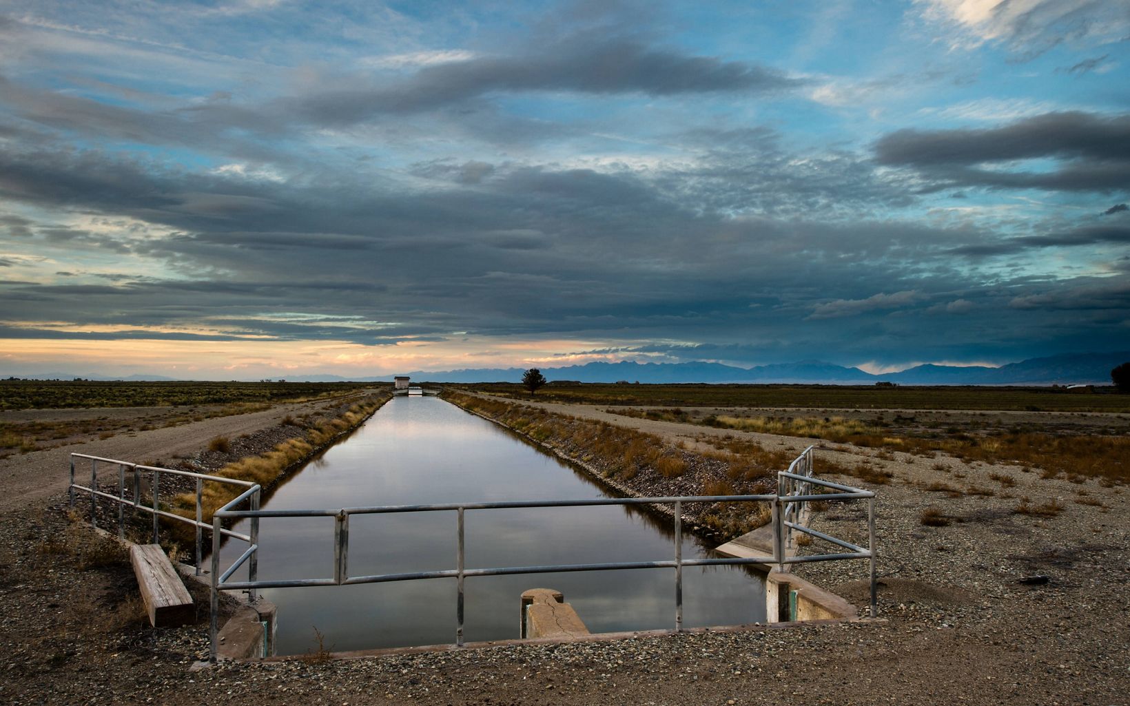 Irrigation channel stretching across the San Luis Valley in Colorado.