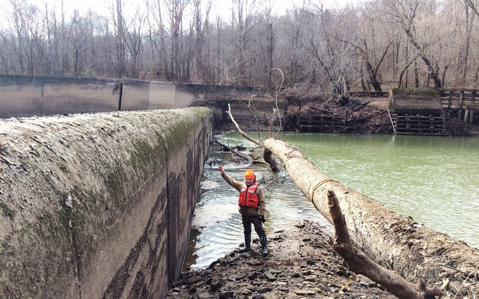 Dam Check Up   A breach occurred on Nov. 25 2016, causing water levels to drop seven feet behind the dam. Here, a U.S. Army Corps of Engineers biologist stands next to the dam after the breach. © U.S. Army Corps of Engineers