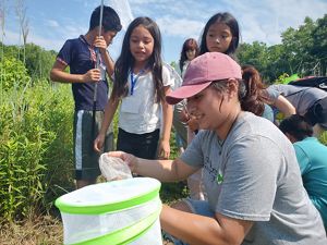 Kids learning outdoors.