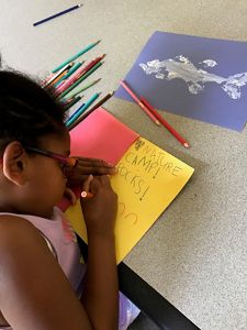 A girl works on an art project.