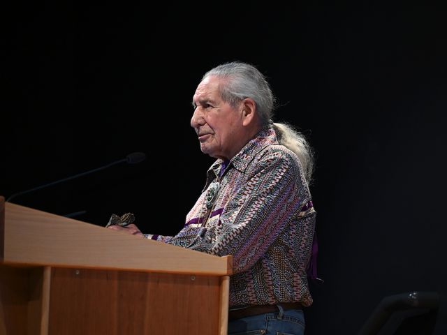 A man standing in front of a podium