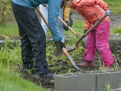 More than 1,000 volunteers removed a 20,000-square-foot parking lot at Kent Hillside Church and built a community garden in its place.