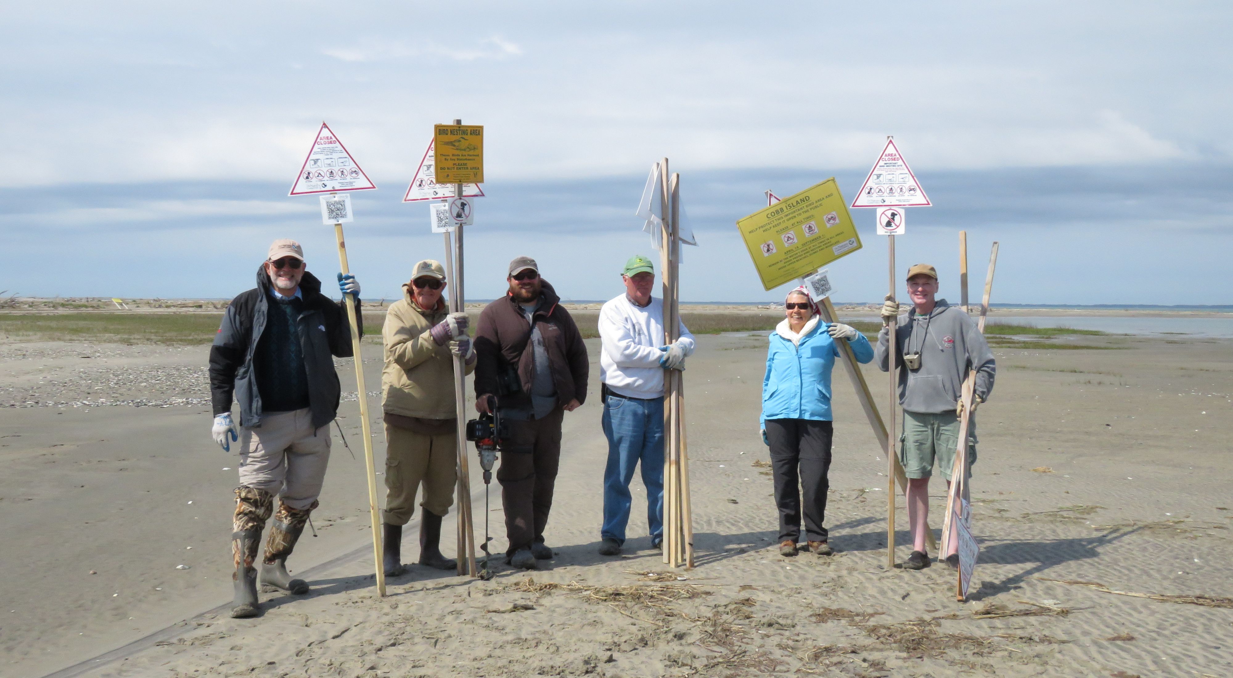 TNC's Island Stewardship team stands on the sands of Virginia's Eastern Shore for training in 2018. 