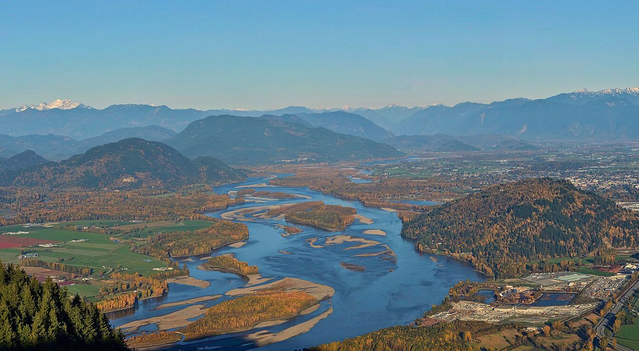 Aerial view of a valley with floodplains.