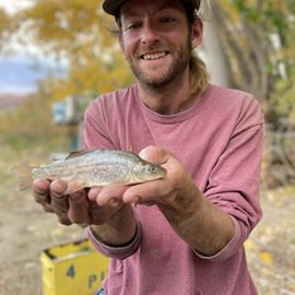 A man holding a fish.