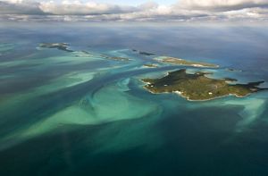 an aerial view of the ocean and sandy banks in the Bahamas.