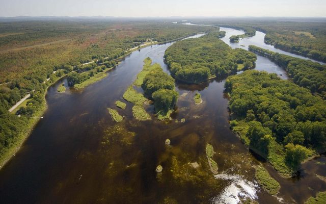Aerial view of Penobscot River watershed featuring islands and shallow waters.