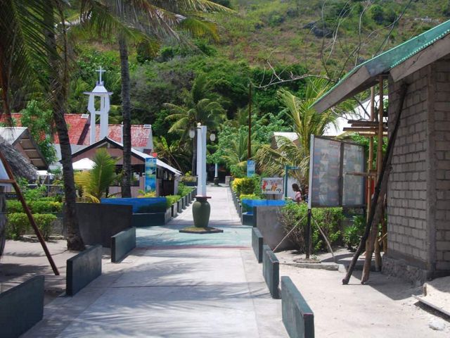 Main street of Welora village, leading to the central village square.