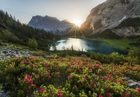 Sunrise over an alpine lake